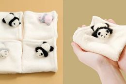 手のひらにちょこん♡毛布の上で寝かせられている、赤ちゃんパンダハンカチ #Z世代Pick